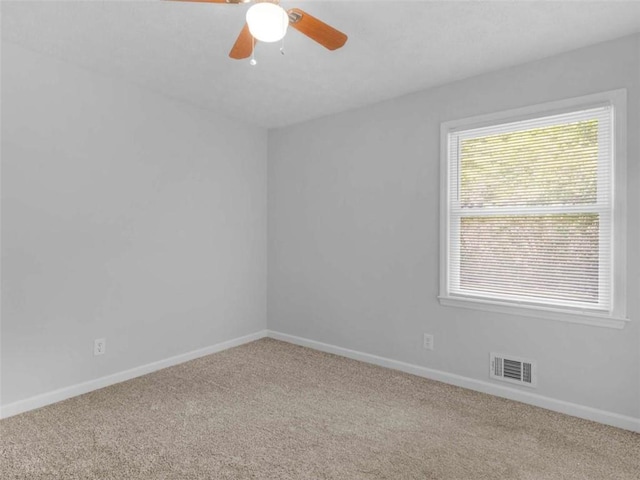 4720 Hull Rd, Conyers, GA 30094 - carpeted empty room featuring baseboards and a ceiling fan