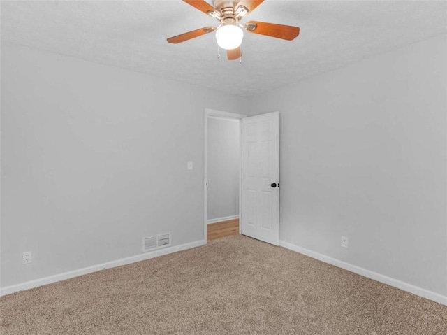 4720 Hull Rd, Conyers, GA 30094 - empty room featuring carpet and ceiling fan