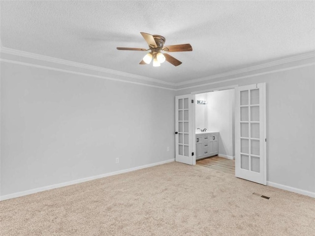 4720 Hull Rd, Conyers, GA 30094 - unfurnished bedroom with french doors, light carpet, a textured ceiling, ornamental molding, and ceiling fan