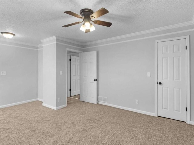 4720 Hull Rd, Conyers, GA 30094 - unfurnished bedroom featuring carpet flooring, a textured ceiling, crown molding, and a ceiling fan