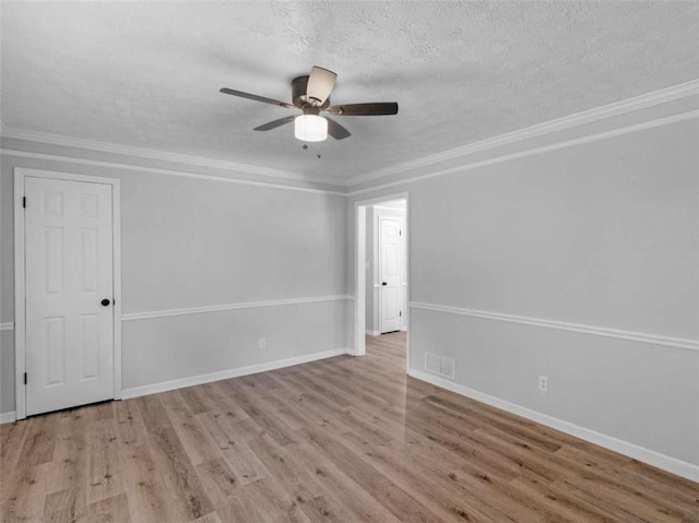 4720 Hull Rd, Conyers, GA 30094 - spare room with wood finished floors, a textured ceiling, a ceiling fan, and ornamental molding