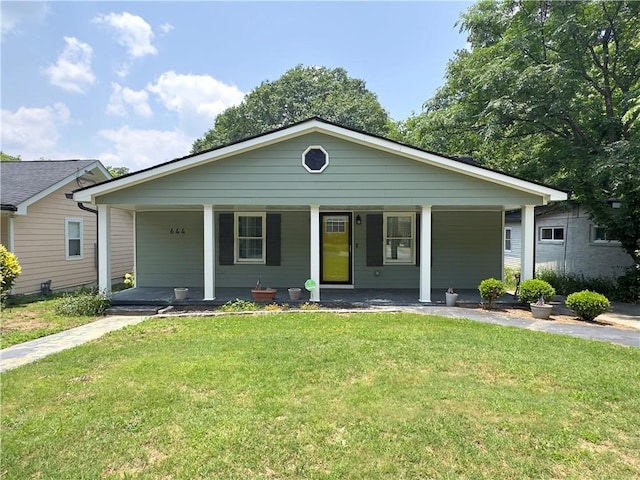 644 Albert St NW, Atlanta, GA 30318 - view of front of house with covered porch and a front lawn