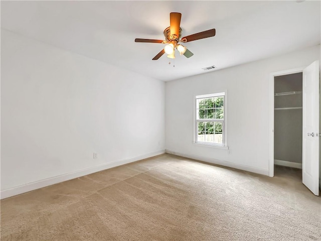 644 Albert St NW, Atlanta, GA 30318 - spare room with light colored carpet and a ceiling fan