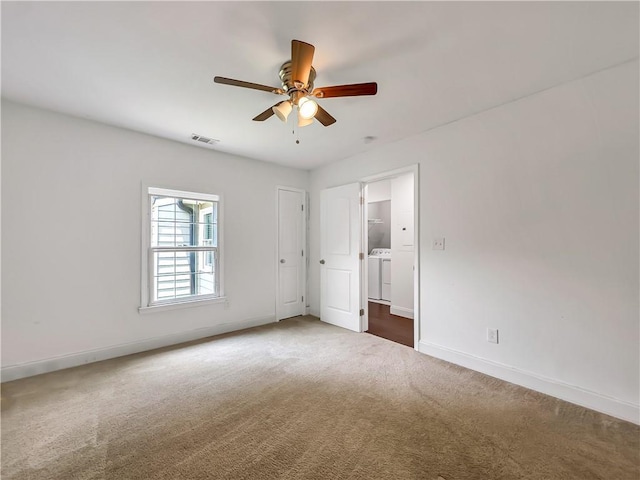 644 Albert St NW, Atlanta, GA 30318 - unfurnished bedroom with carpet floors, washer and dryer, and a ceiling fan