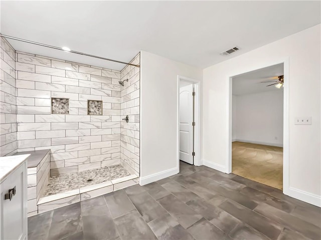 644 Albert St NW, Atlanta, GA 30318 - bathroom featuring a tile shower, ceiling fan, and vanity
