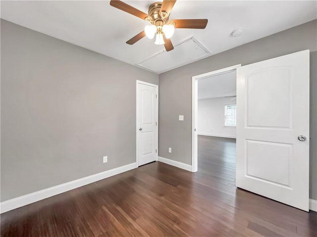 644 Albert St NW, Atlanta, GA 30318 - spare room with attic access, a ceiling fan, wood finished floors, and a smoke detector