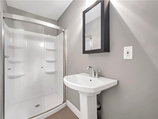 644 Albert St NW, Atlanta, GA 30318 - full bathroom with a shower stall and tile patterned flooring