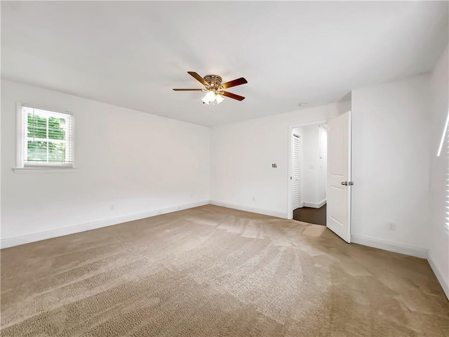 644 Albert St NW, Atlanta, GA 30318 - empty room featuring light colored carpet and ceiling fan