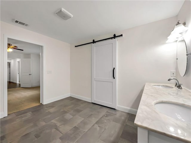 644 Albert St NW, Atlanta, GA 30318 - bathroom featuring double vanity and ceiling fan