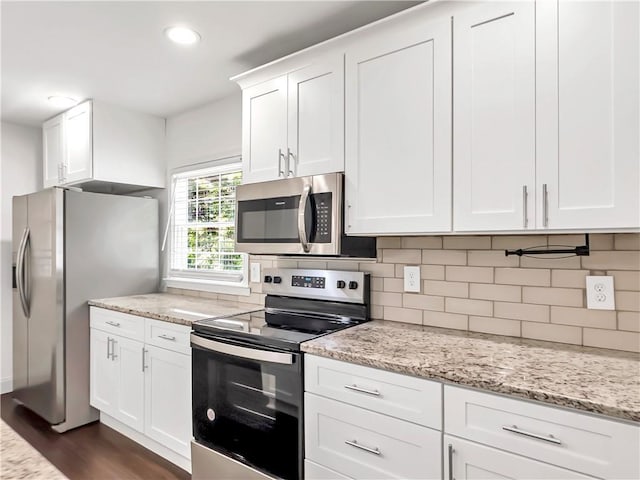 644 Albert St NW, Atlanta, GA 30318 - kitchen featuring stainless steel appliances, decorative backsplash, dark wood-style floors, white cabinetry, and recessed lighting