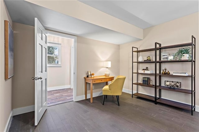 office with dark wood finished floors and baseboards