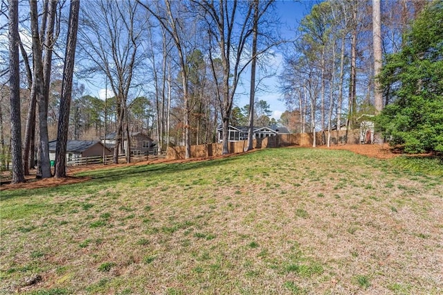 view of yard featuring fence