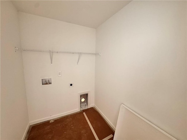 clothes washing area featuring hookup for a washing machine and electric dryer hookup