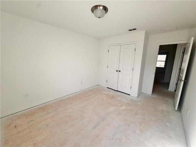 unfurnished bedroom featuring a closet