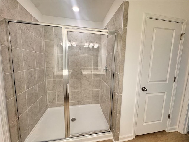 bathroom featuring a stall shower