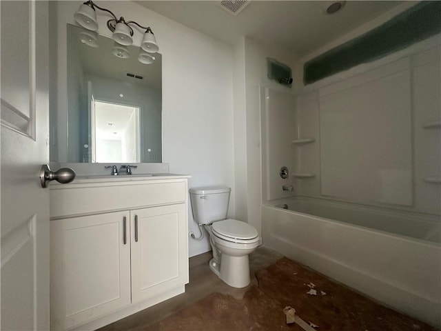 full bathroom featuring shower / washtub combination, vanity, and toilet