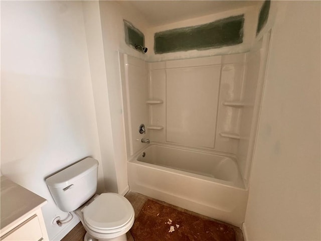 bathroom with toilet and washtub / shower combination