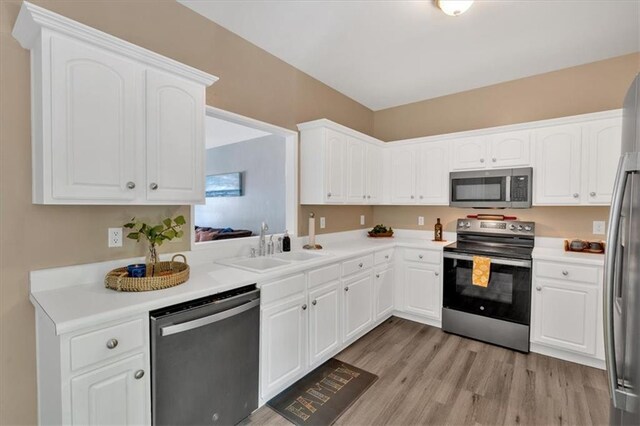 261 Venture Path, Hiram, GA 30141 - living area with wood finished floors, ceiling fan, and stairs