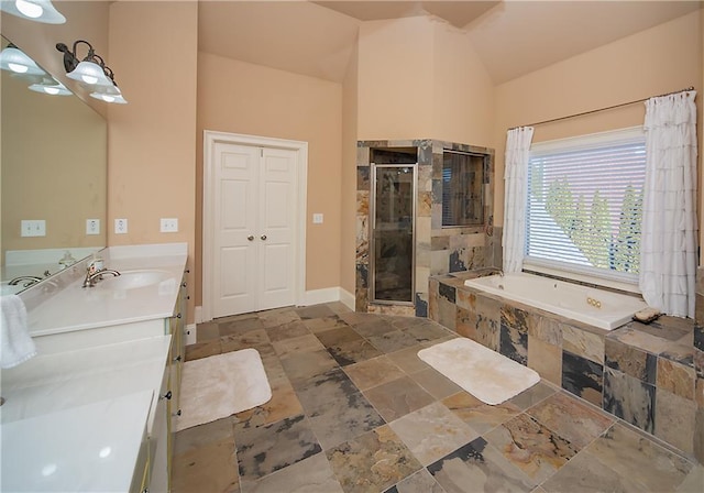 full bathroom featuring a stall shower, baseboards, lofted ceiling, vanity, and a bath