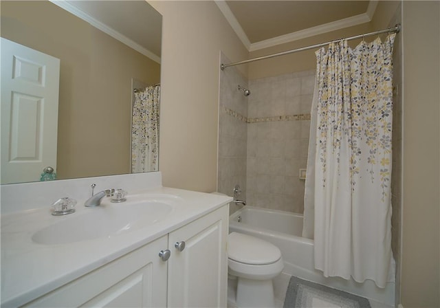 bathroom with vanity, ornamental molding, shower / bath combo with shower curtain, and toilet