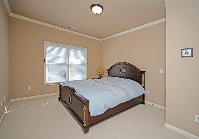 carpeted bedroom featuring ornamental molding, visible vents, and baseboards