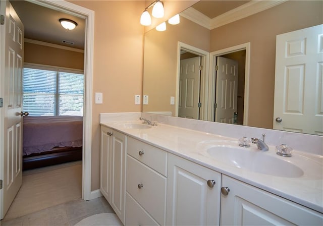 full bath with ornamental molding, tile patterned flooring, a sink, and double vanity