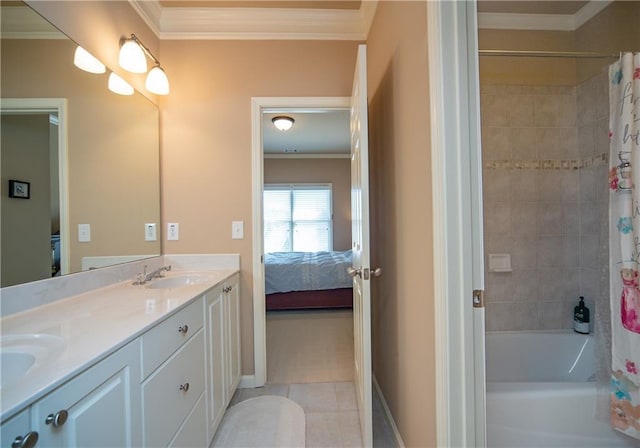 bathroom with double vanity, ensuite bath, ornamental molding, tile patterned floors, and a sink