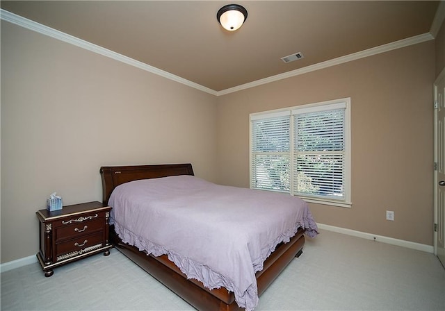 bedroom featuring light carpet, crown molding, and baseboards