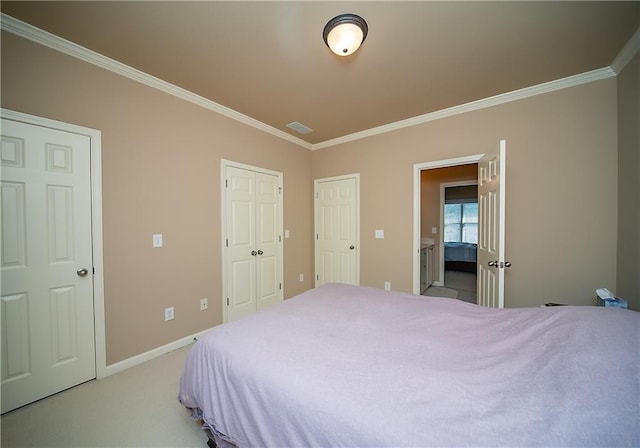 bedroom featuring light carpet, ornamental molding, and visible vents