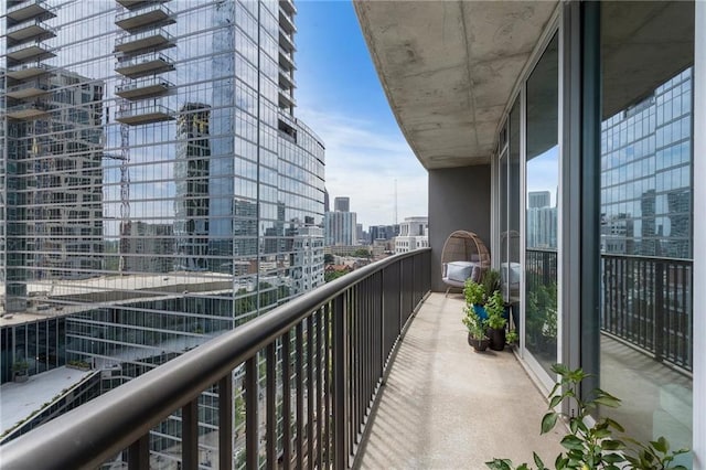 balcony featuring a city view