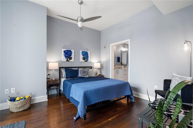 bedroom with ceiling fan, ensuite bath, baseboards, and wood finished floors