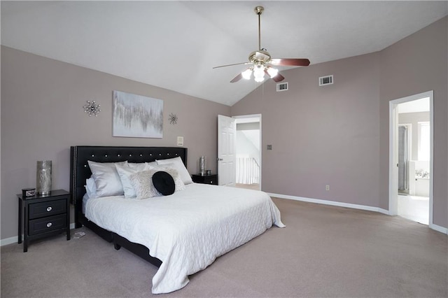 carpeted bedroom with lofted ceiling, ensuite bath, and ceiling fan