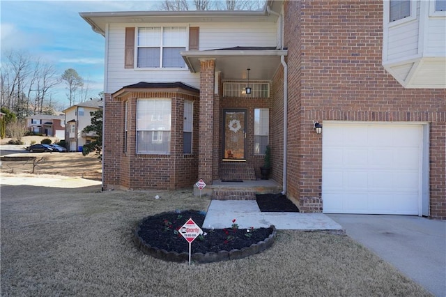 property entrance with a garage