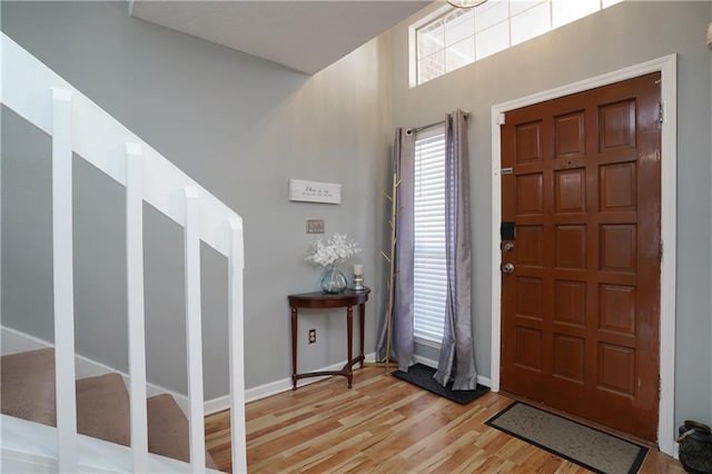 entrance foyer with light hardwood / wood-style floors