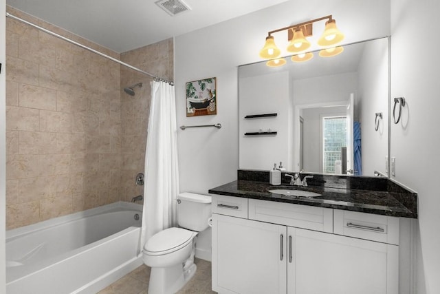 855 Peachtree St NE Unit 2706, Atlanta, GA 30308 - bathroom featuring vanity, shower / tub combo with curtain, tile patterned flooring, toilet, and visible vents