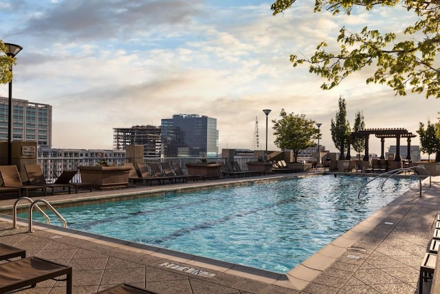 855 Peachtree St NE Unit 2706, Atlanta, GA 30308 - community pool with a pergola, a patio area, and a view of city