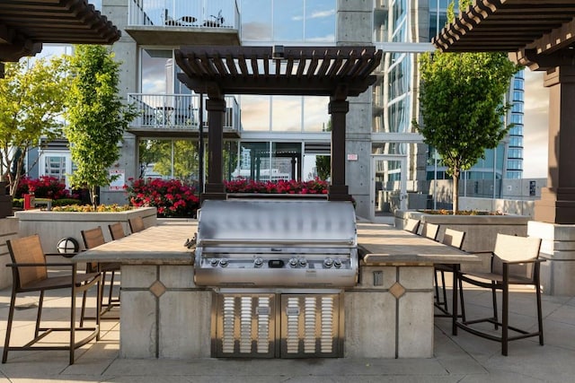 855 Peachtree St NE Unit 2706, Atlanta, GA 30308 - view of patio with a grill, area for grilling, outdoor dry bar, and a pergola