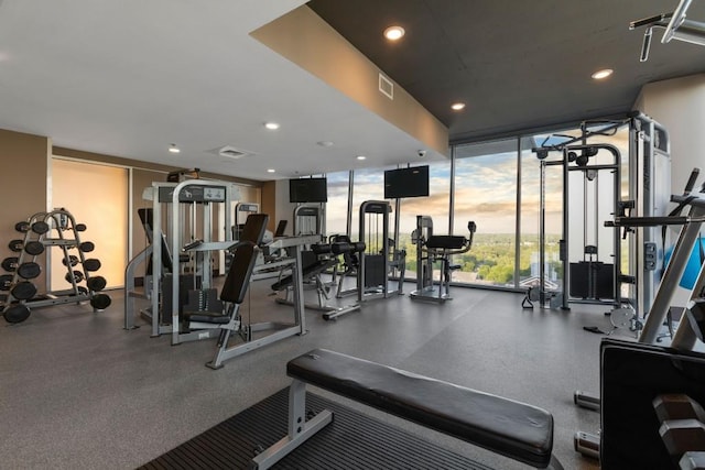 855 Peachtree St NE Unit 2706, Atlanta, GA 30308 - gym with visible vents, a wall of windows, and recessed lighting
