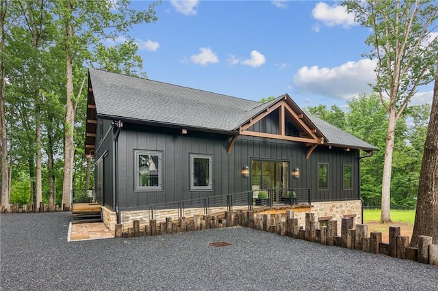 150 Trinity Farm Dr, Canton, GA 30115 - view of front of property featuring stone siding, board and batten siding, and a shingled roof