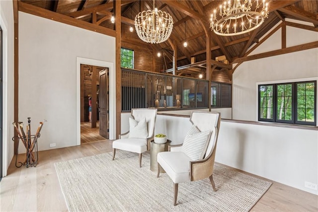 150 Trinity Farm Dr, Canton, GA 30115 - sitting room featuring a chandelier, high vaulted ceiling, wood finished floors, and a wooden ceiling with exposed beams