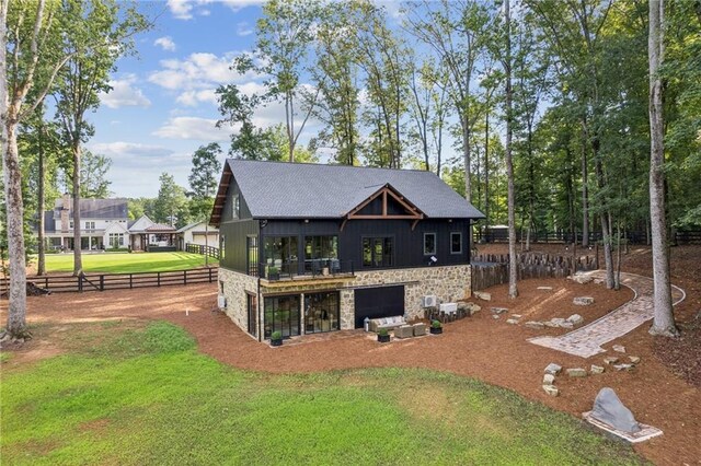 150 Trinity Farm Dr, Canton, GA 30115 - rear view of house with stone siding and a shingled roof