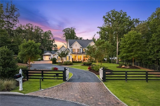 150 Trinity Farm Dr, Canton, GA 30115 - view of front of home with a fenced front yard and curved driveway
