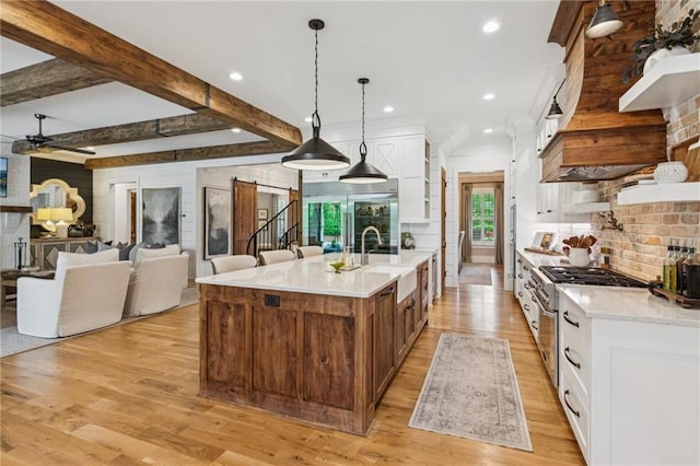 150 Trinity Farm Dr, Canton, GA 30115 - kitchen featuring high end stainless steel range, a ceiling fan, white cabinetry, light wood-style flooring, and recessed lighting