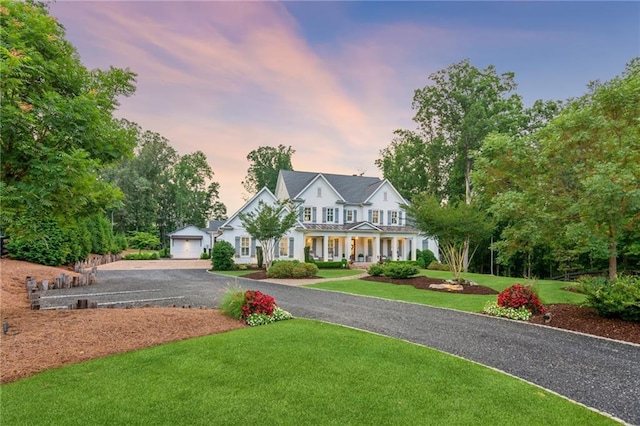 150 Trinity Farm Dr, Canton, GA 30115 - view of front of home with a lawn, a porch, and a detached garage