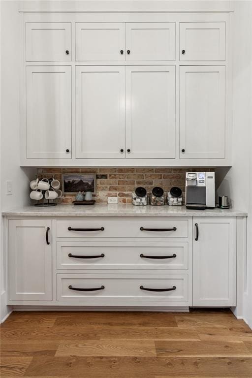150 Trinity Farm Dr, Canton, GA 30115 - bar area featuring decorative backsplash and light wood-style floors