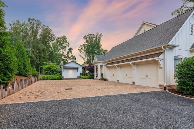 150 Trinity Farm Dr, Canton, GA 30115 - view of front of property featuring board and batten siding, a shingled roof, and driveway