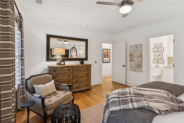 150 Trinity Farm Dr, Canton, GA 30115 - bedroom featuring wood finished floors, ensuite bathroom, crown molding, and a ceiling fan