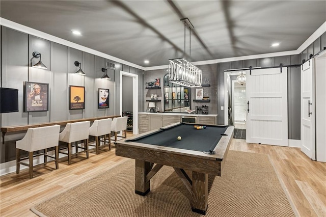 150 Trinity Farm Dr, Canton, GA 30115 - recreation room featuring ornamental molding, a barn door, bar, light wood-style floors, and pool table