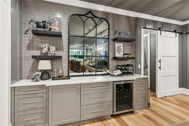 150 Trinity Farm Dr, Canton, GA 30115 - indoor dry bar featuring wine cooler, light wood-type flooring, and a barn door