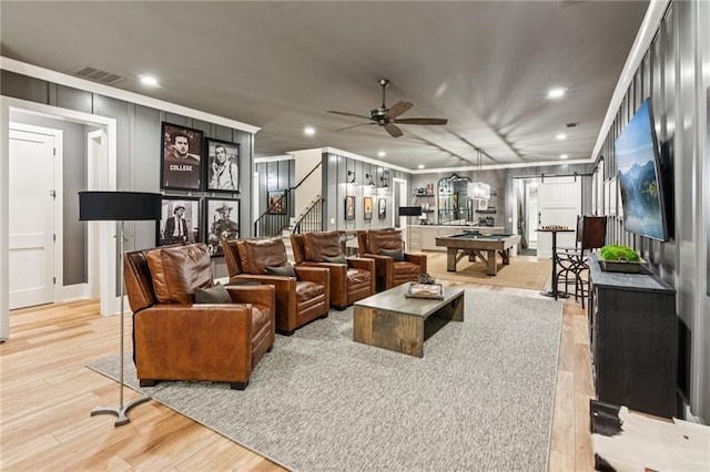 150 Trinity Farm Dr, Canton, GA 30115 - living area featuring wood finished floors, crown molding, ceiling fan, recessed lighting, and a decorative wall